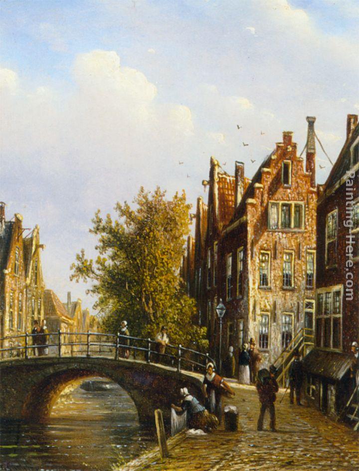 Johannes Franciscus Spohler A Dutch town with figures on a canal